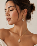 Pack Cowrie - collar y pendientes con concha natural dorada